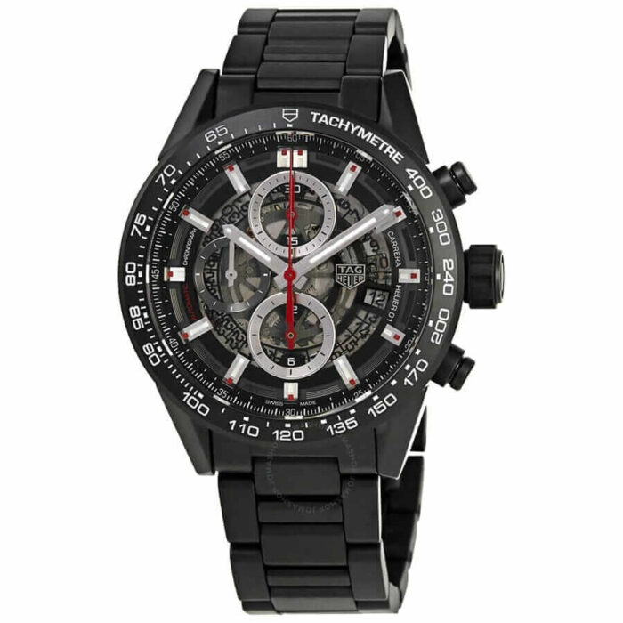 Close-up of TAG Heuer Carrera Calibre 1887 replica watch showcasing silver dial with chronograph subdials, stainless steel case, and black leather strap.