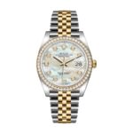 Lifestyle shot of a luxury replica watch featuring a silver dial and stainless steel bracelet, showcased on a textured fabric background.