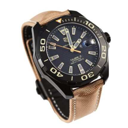 TAG Heuer Aquaracer Calibre 5 replica watch with blue dial, stainless steel case, and stainless steel bracelet.